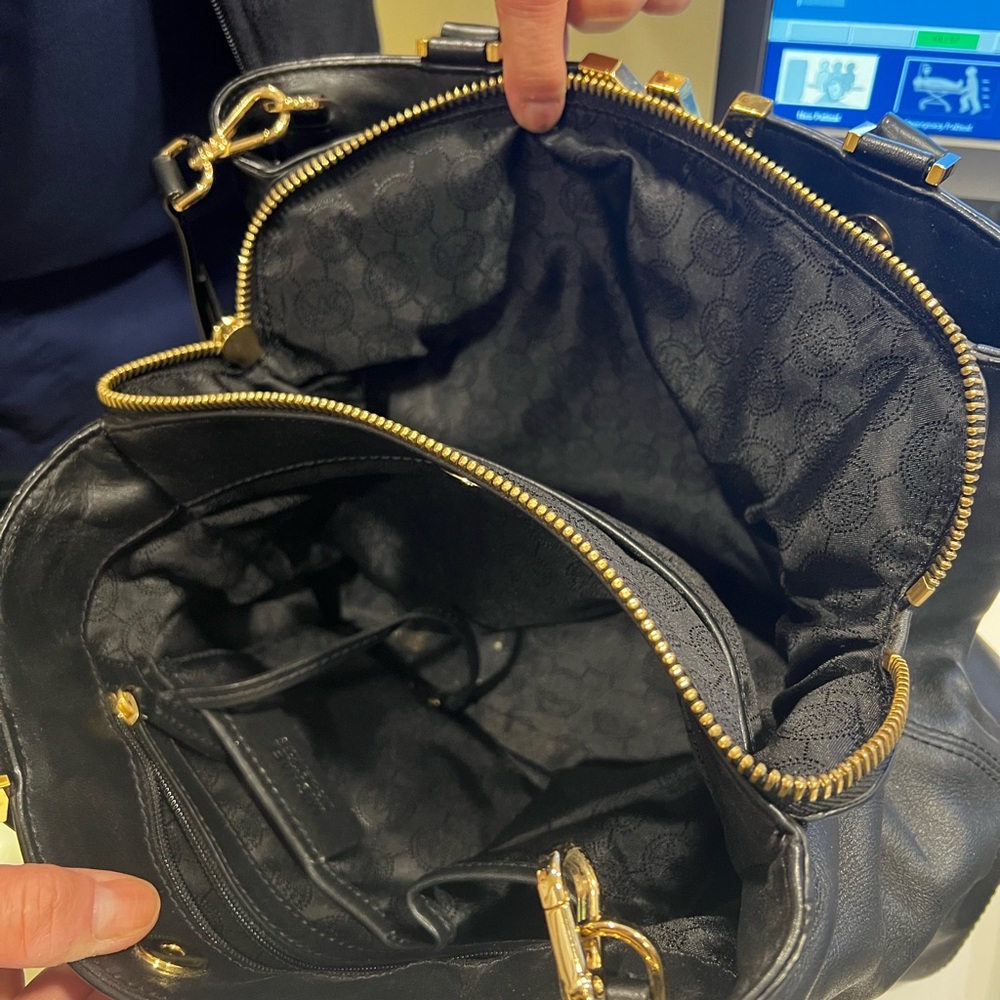 Large black leather Michael Kors tote with king strap